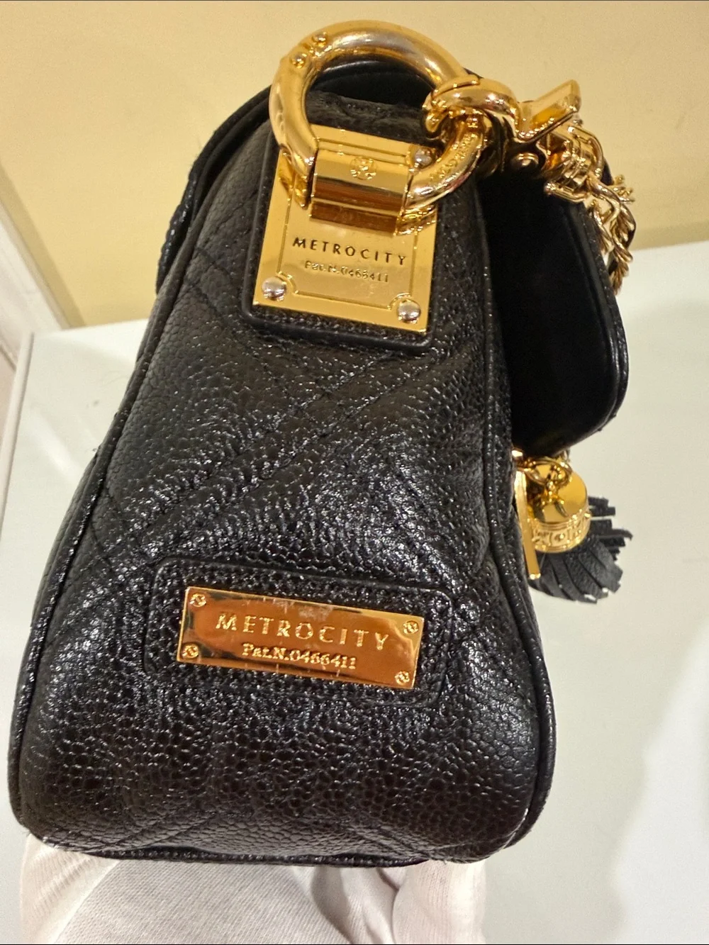 MetroCity Genuine CAVIAR Leather black quilted handbag - Tassel Accent